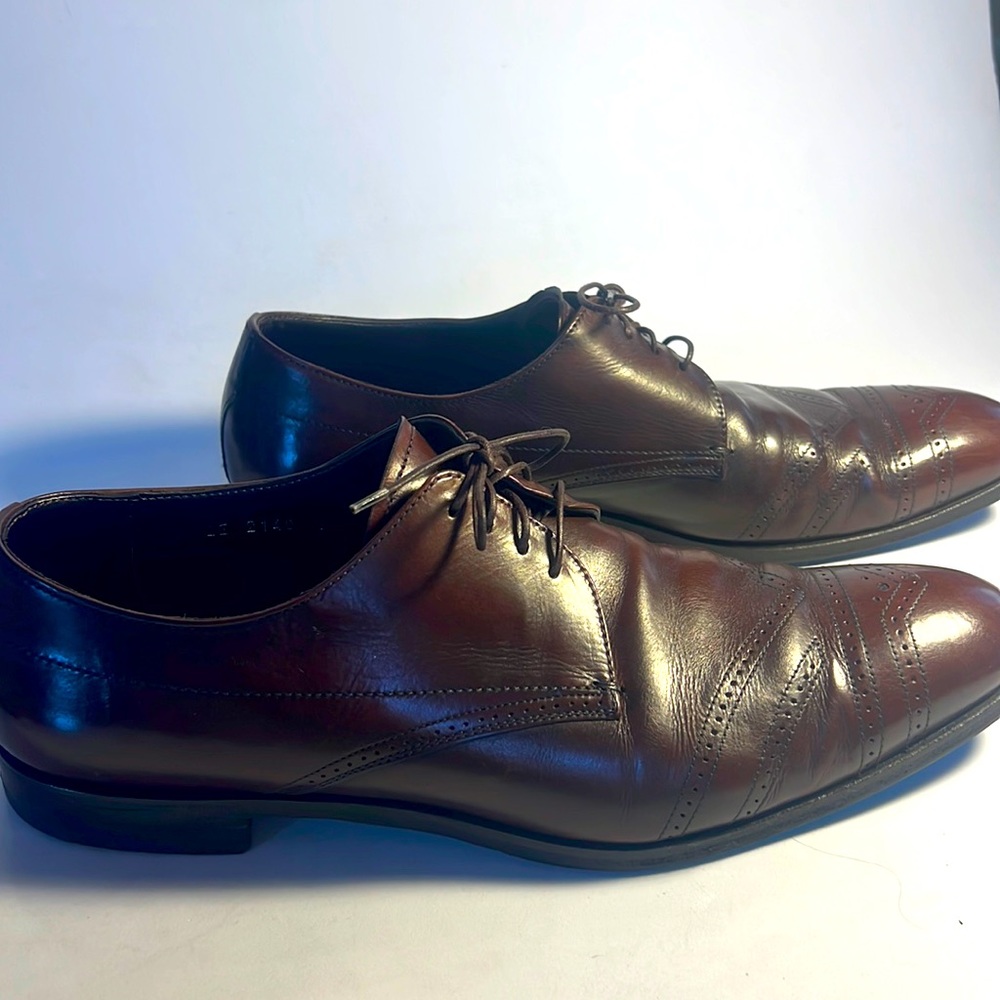 Prada men’s shoe with cap toe stitching.